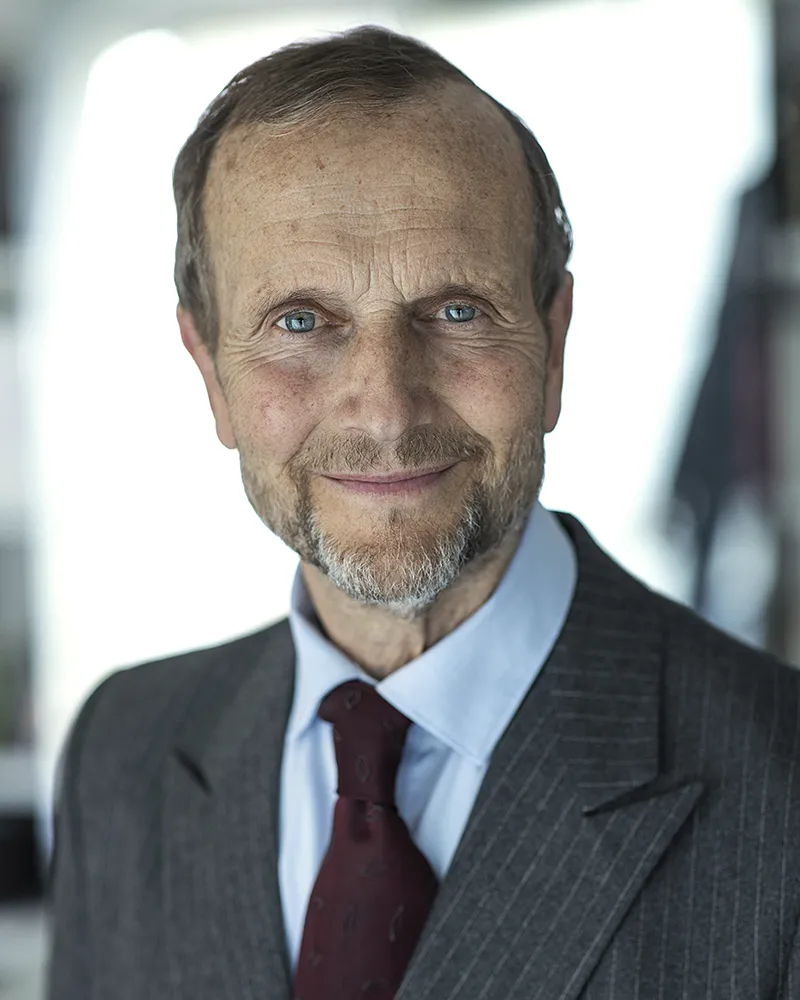 Natural corporate headshot of man in business attire in London