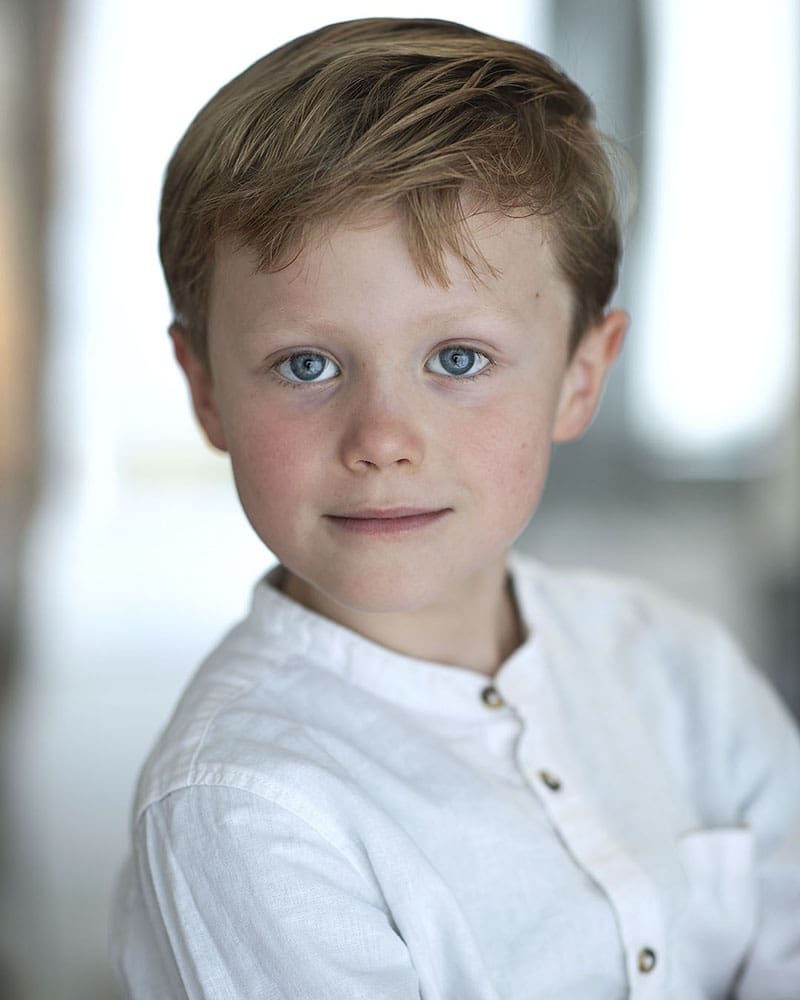 Neutral studio headshot of child actor Atticus Hurst-Brown taken by London headshot photographer Remy Hunter