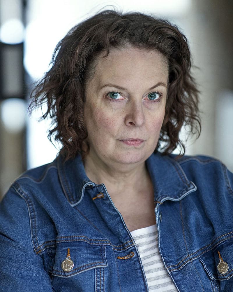 Character headshot outdoors in natural light of actress Brigid Lohrey