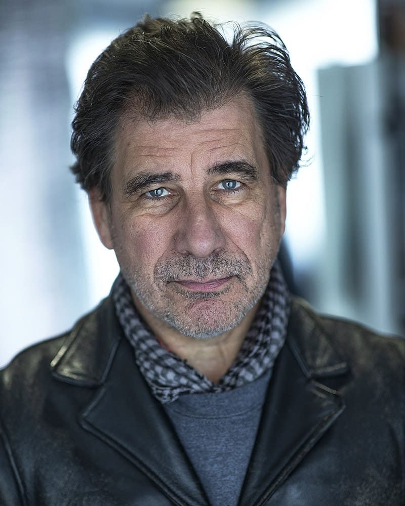 Serious natural light studio headshot of actror Gwilym Lloyd taken by London headshot photographer Remy Hunter