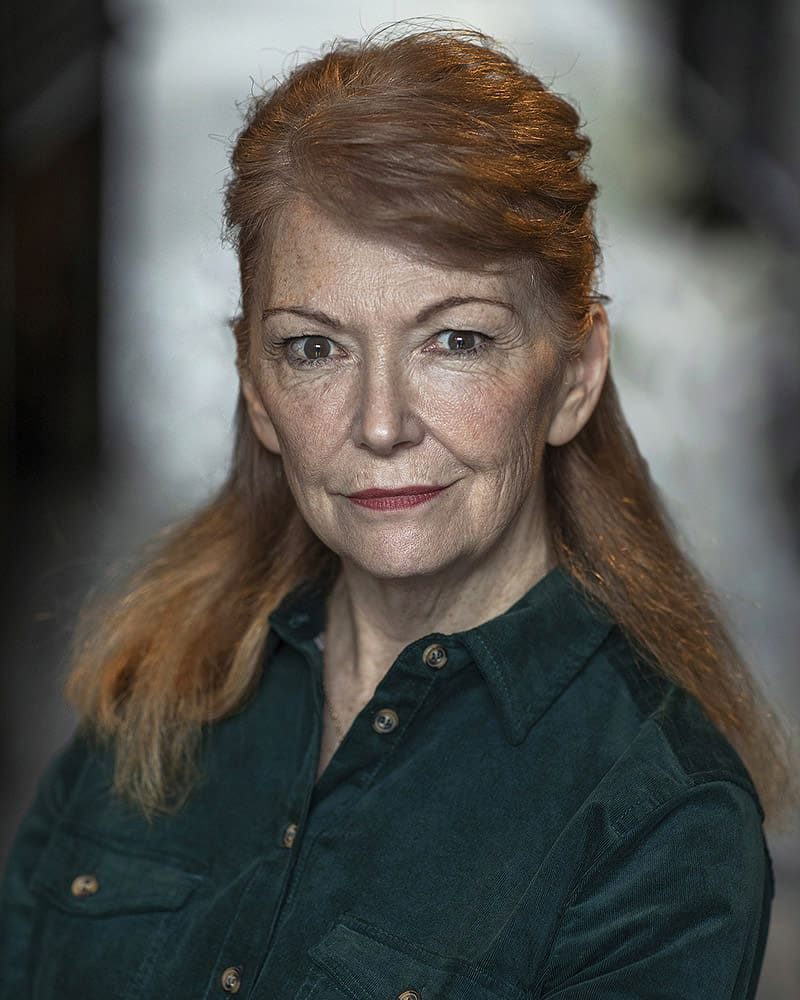 Detective look headshot taken outdoors of actress Sarah Helsby Hughes taken by London headshot photographer Remy Hunter