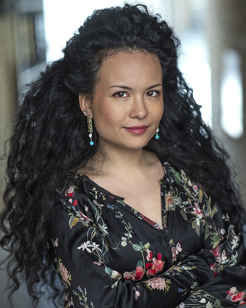 Smiley outdoor professional headshot in natural light of actress Jade May Lin