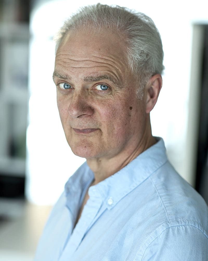 Neutral studio headshot of actor Alasdair Baker taken by London headshot photographer Remy Hunter