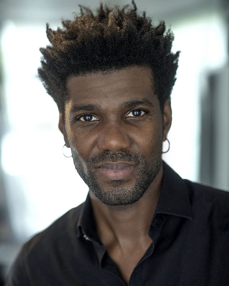 Natural light studio headshot of actor Lawrence Reuben Brown taken by London headshot photographer Remy Hunter