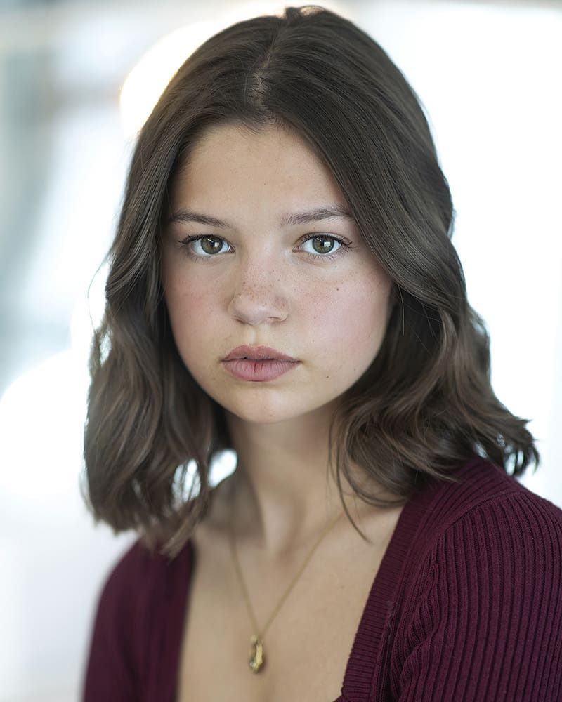 Pensive studio headshot of actress Lola Jenkins taken by London headshot photographer Remy Hunter
